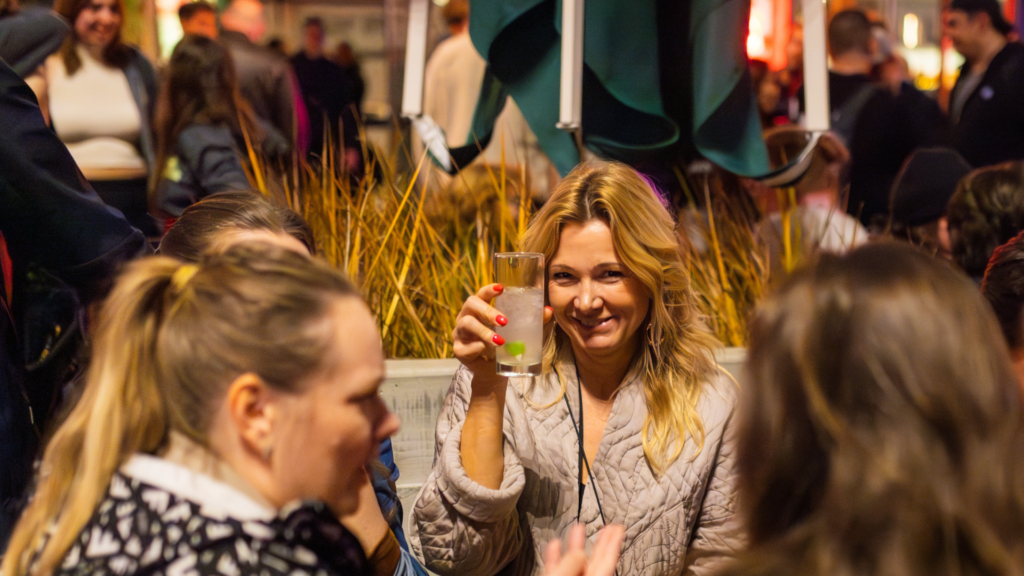 Union Square SF event venue with corporate attendees toasting the party.